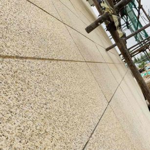 宣城 黄金麻花岗岩荔枝面外墙干挂石材效果示例